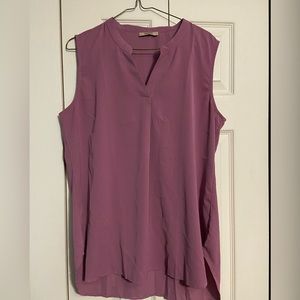 New-without tags.  Sleeveless, lightweight blouse.